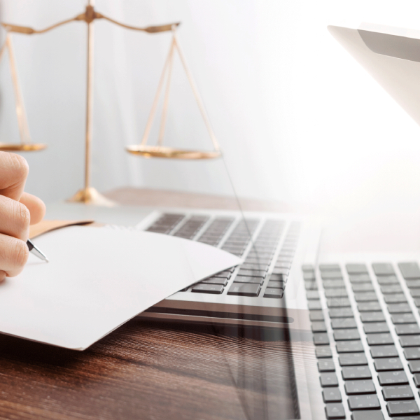 Legal professionals reviewing a contract